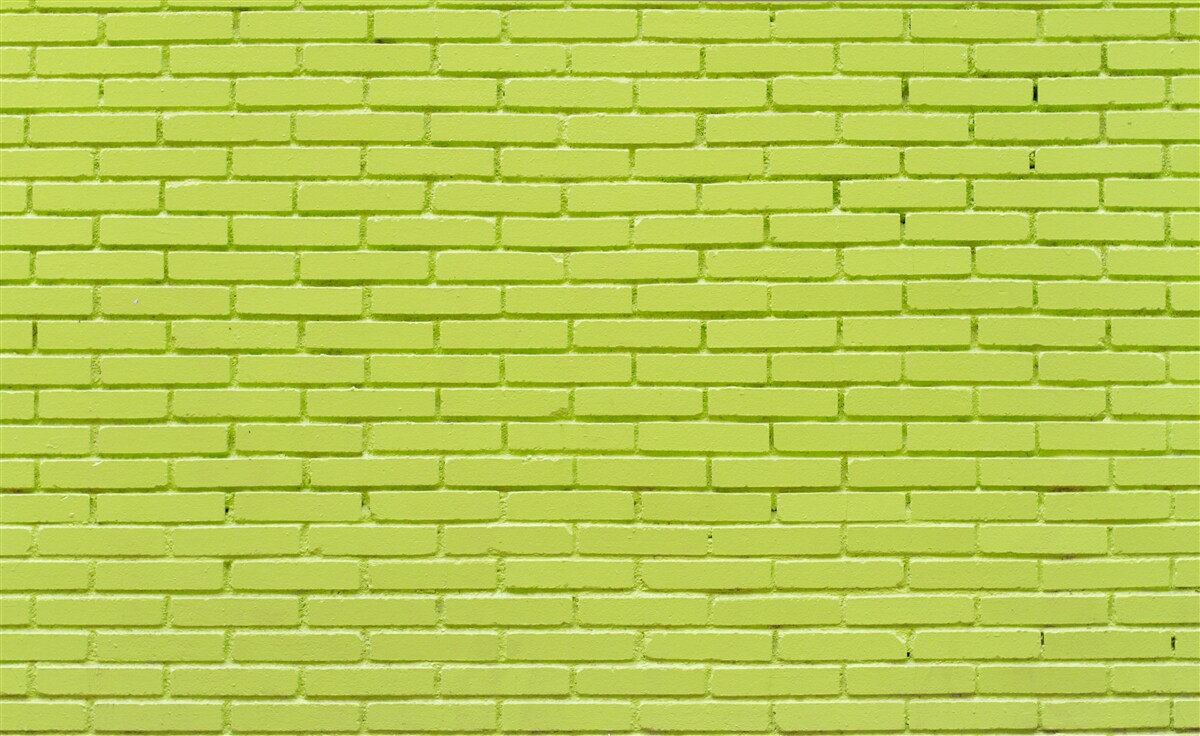Fototapeta Ściana z cegieł w jasnym zielonym odcieniu