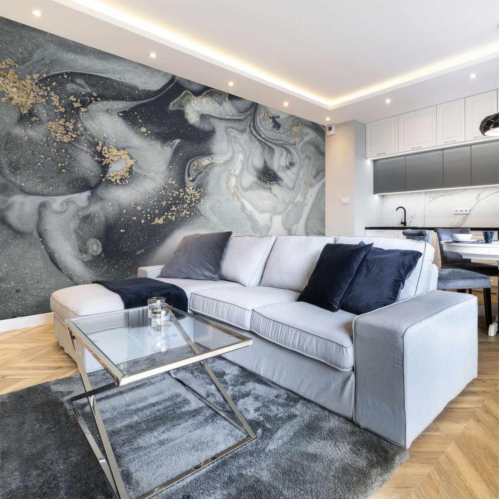 Fototapeta złote ziarna piasku na szarej marmurowej powierzchni