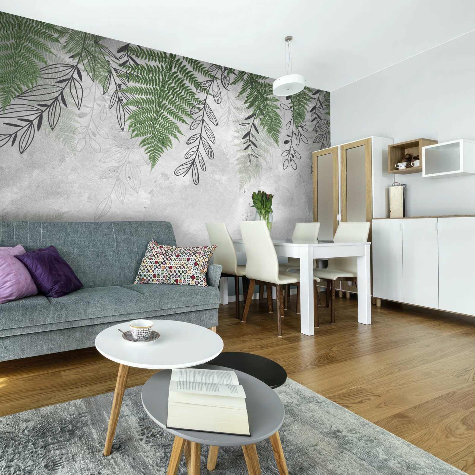 Fototapeta liście paproci w zielonym odcieniu na szarym tle