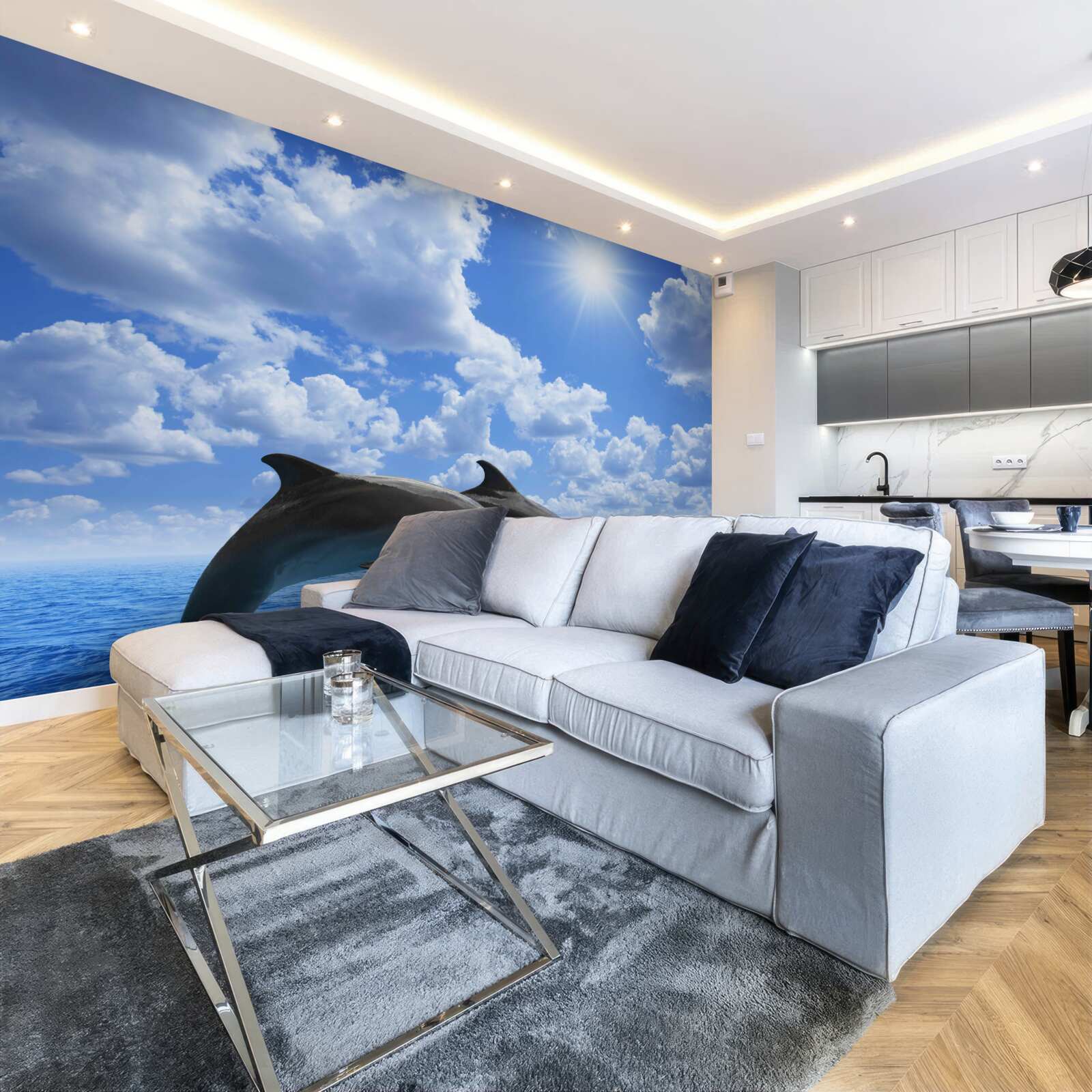 Fototapeta delfiny skaczące nad powierzchnią wody