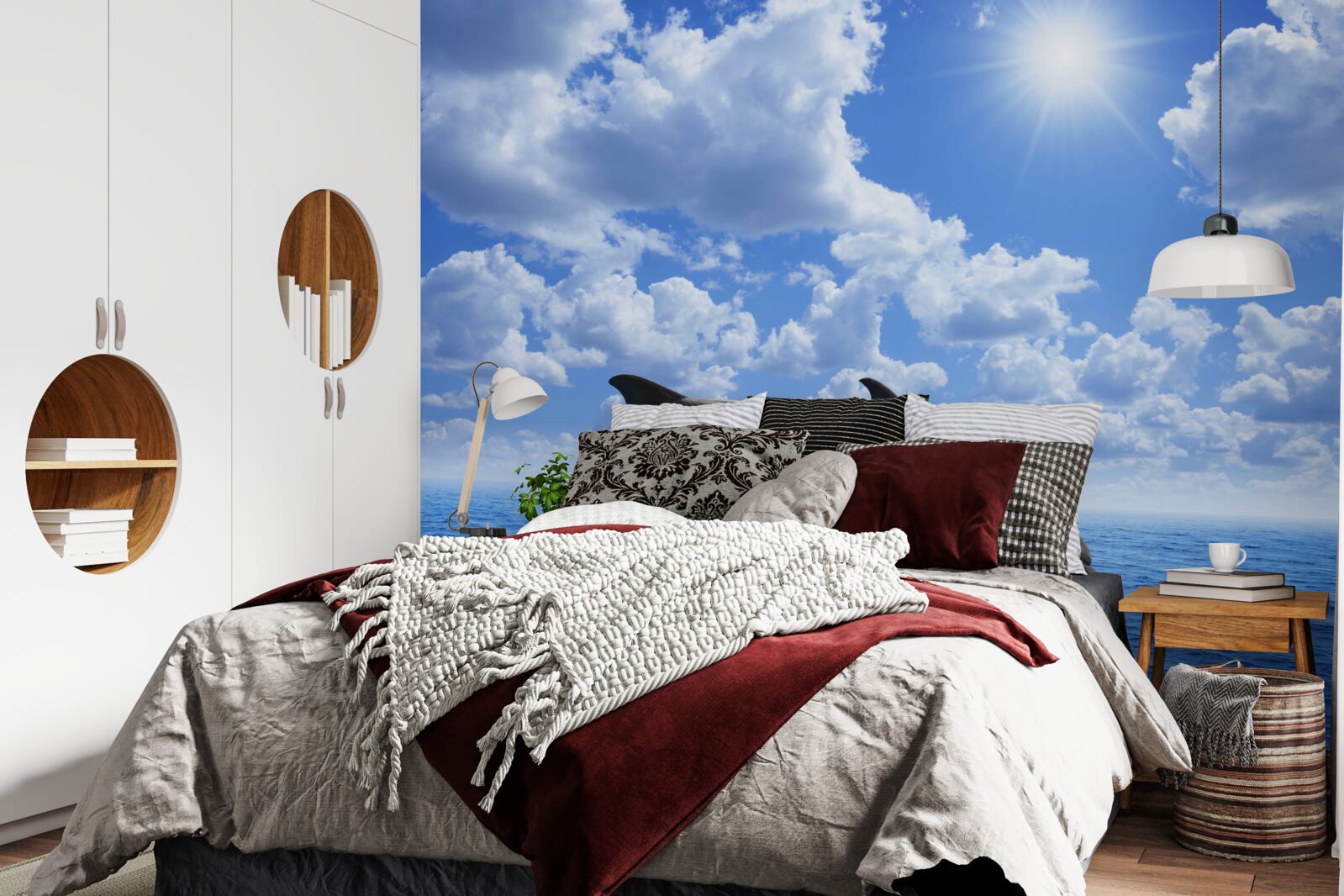 Fototapeta delfiny skaczące nad powierzchnią wody