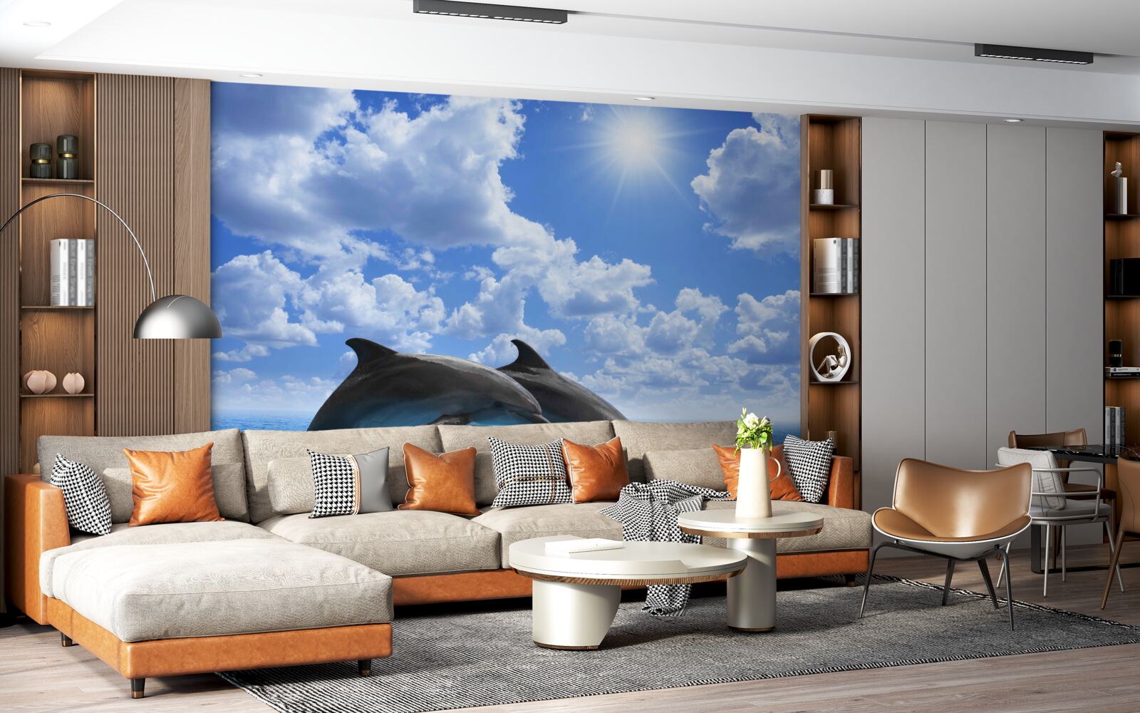 Fototapeta delfiny skaczące nad powierzchnią wody