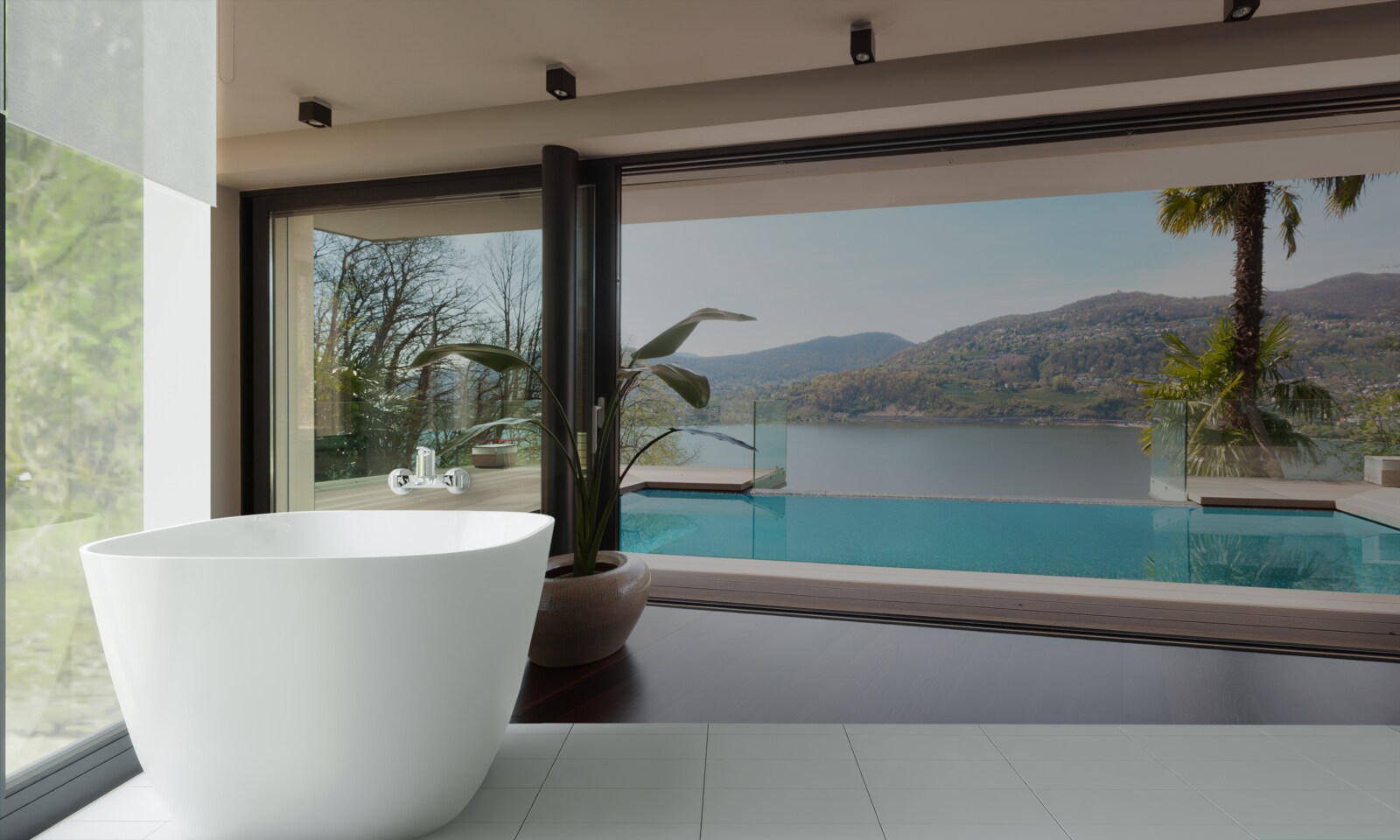 Fototapeta ekskluzywny basen z panoramicznym widokiem na pasmo górskie