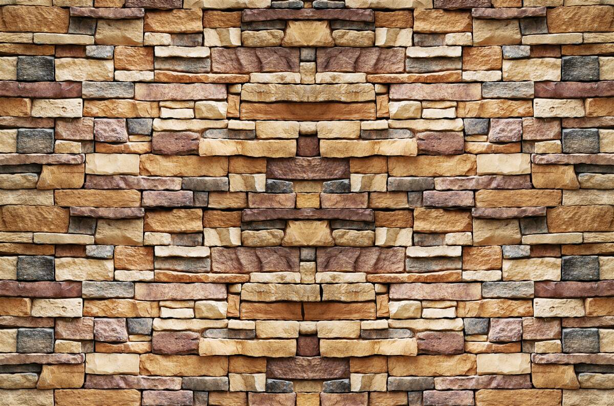 Fototapeta Ściana złożona z wielobarwnych kamieni