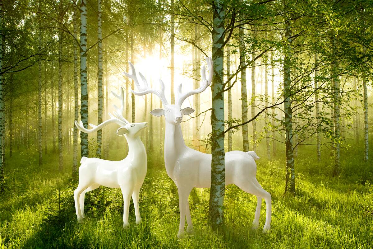 Fototapeta biały jeleń w zielonkawym lesie