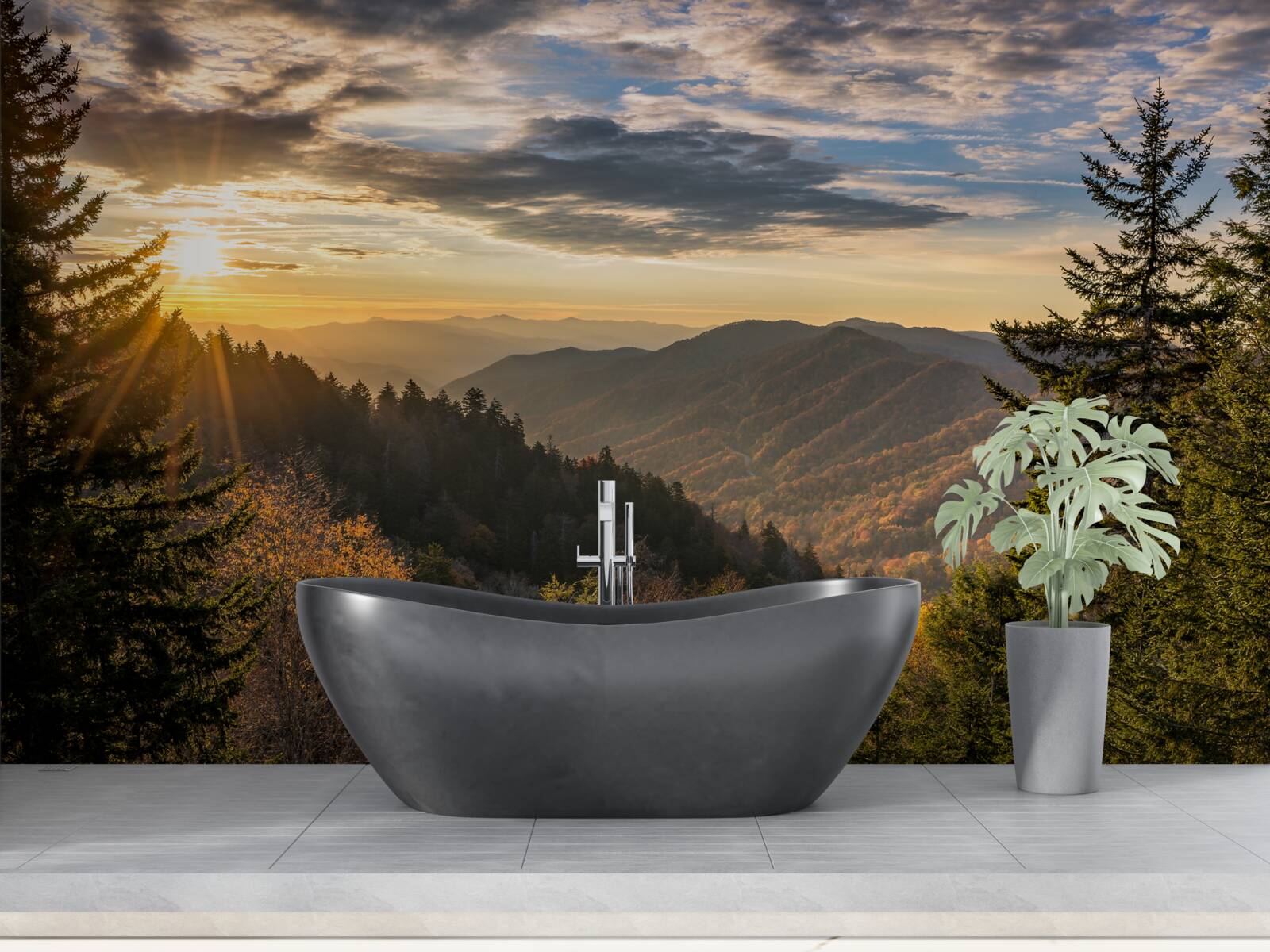 Fototapeta zachodzące słońce nad górskimi szczytami