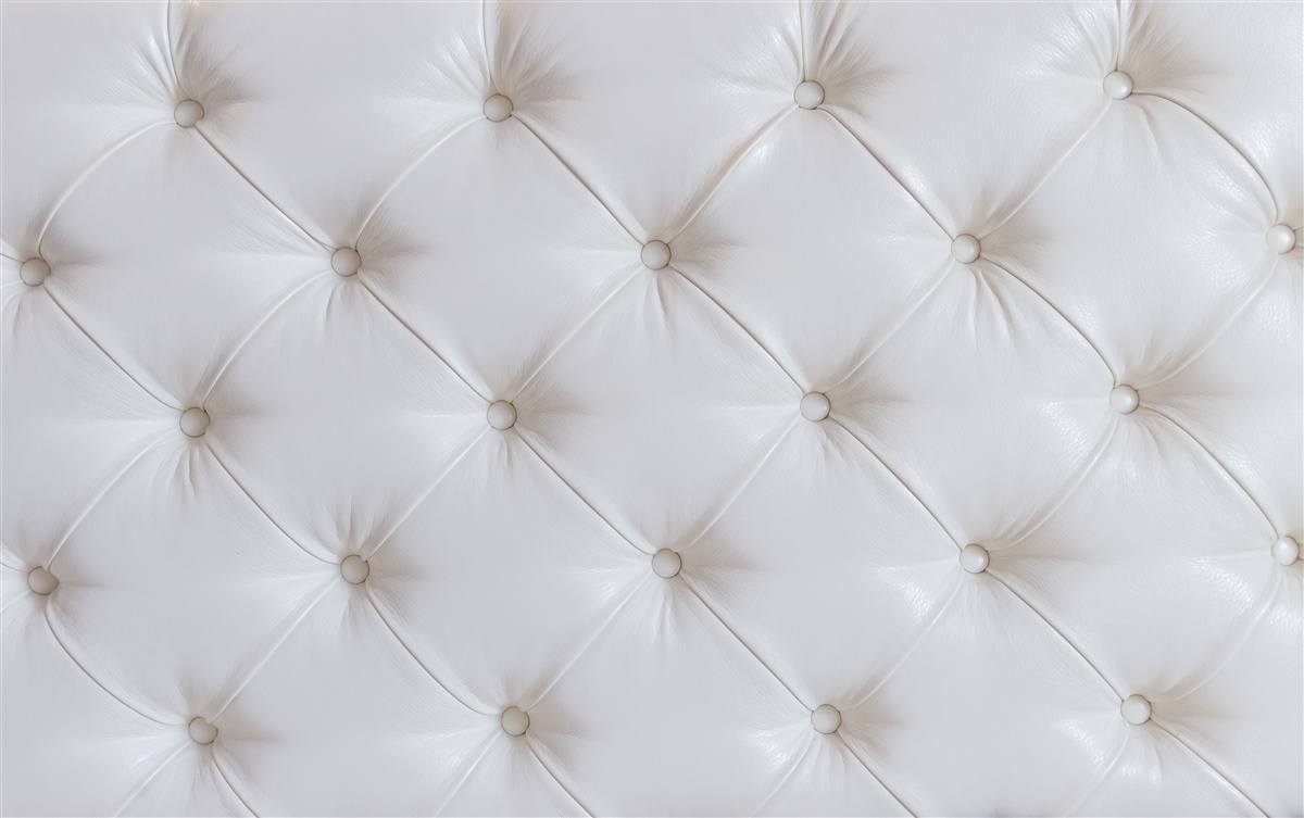 Fototapeta tapicerka z białej skóry z dekoracją ze strasu