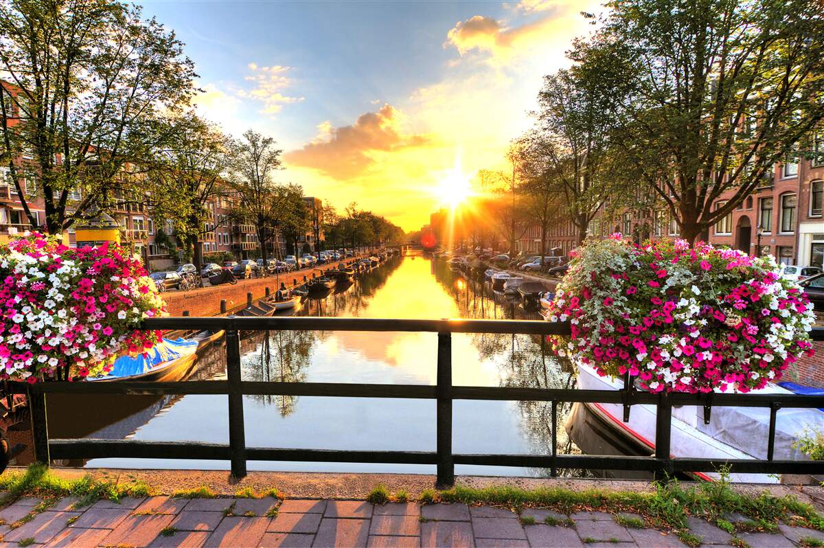 Fototapeta serce amsterdamu spowija zachód słońca