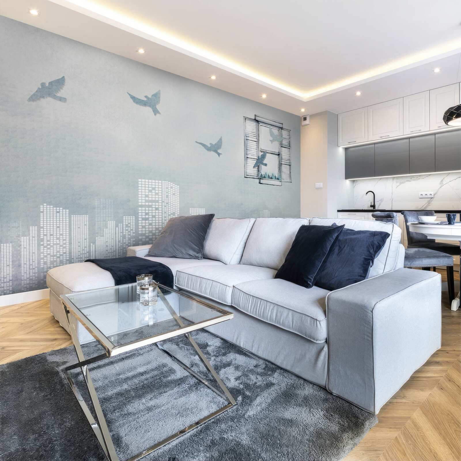 Fototapeta ptaki latające nad dużym miastem