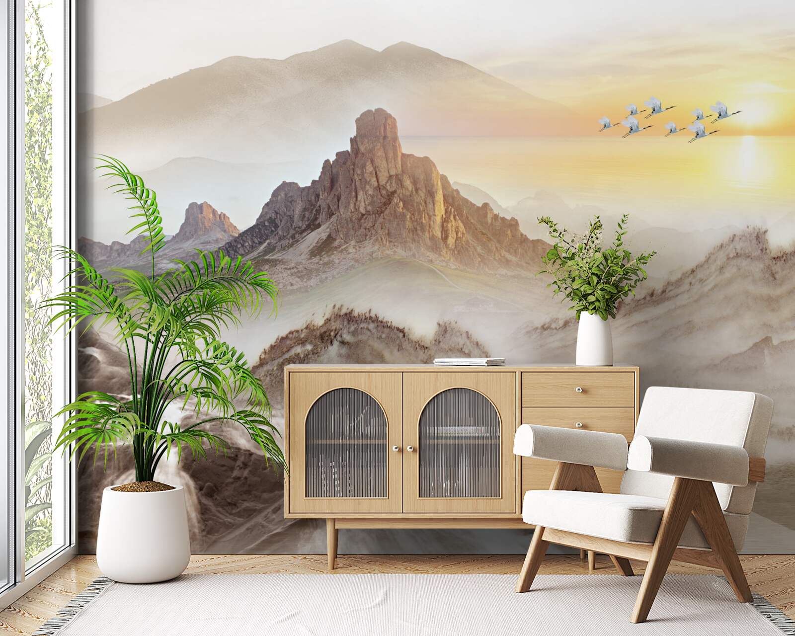 Fototapeta zachód słońca pod górami przechodzącymi z żurawiami