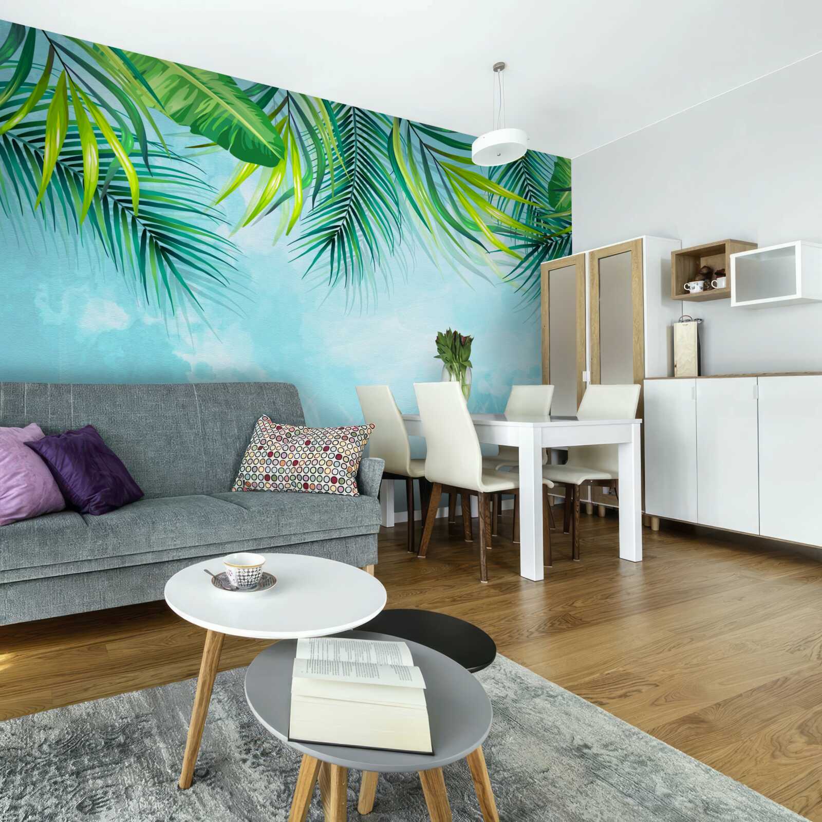 Fototapeta tropikalne liście na tle błękitnego nieba