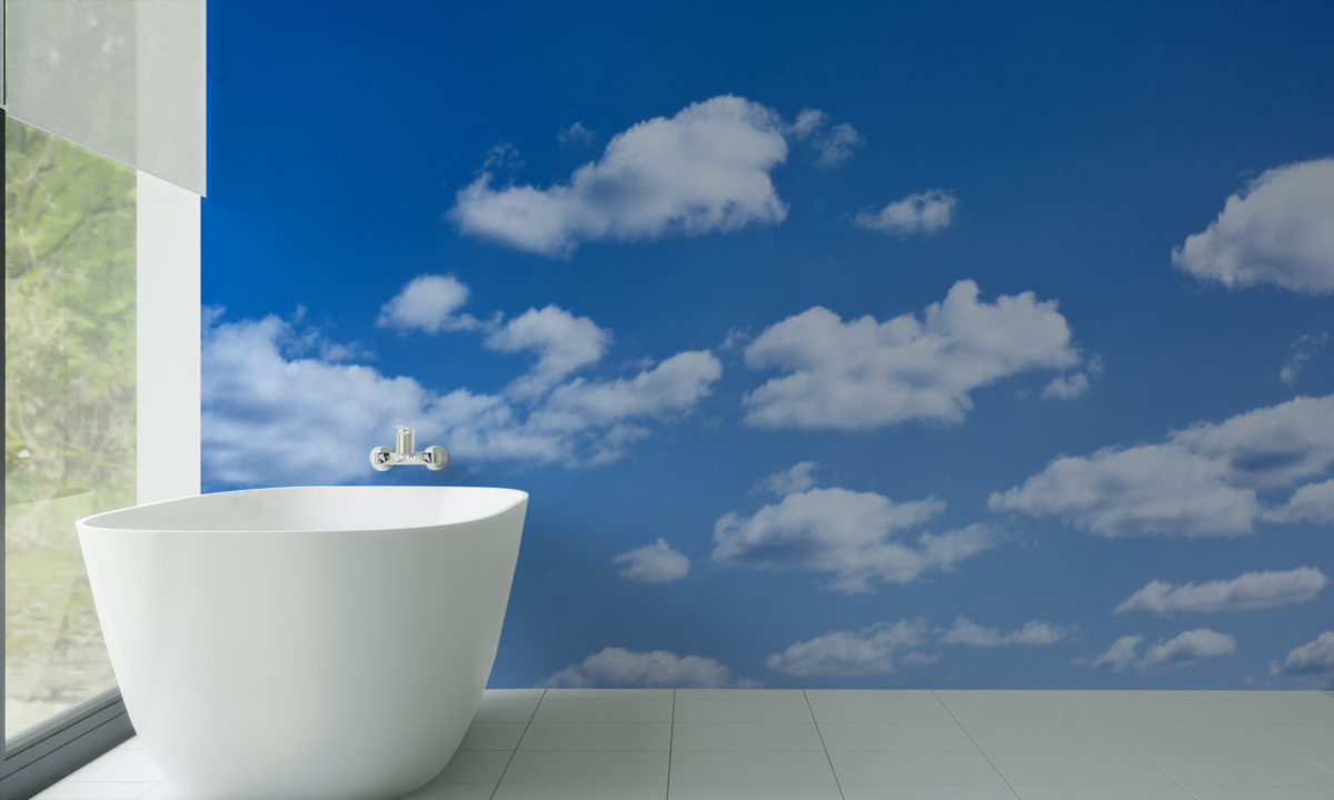 Fototapeta białe chmury unoszące się na błękitnym niebie