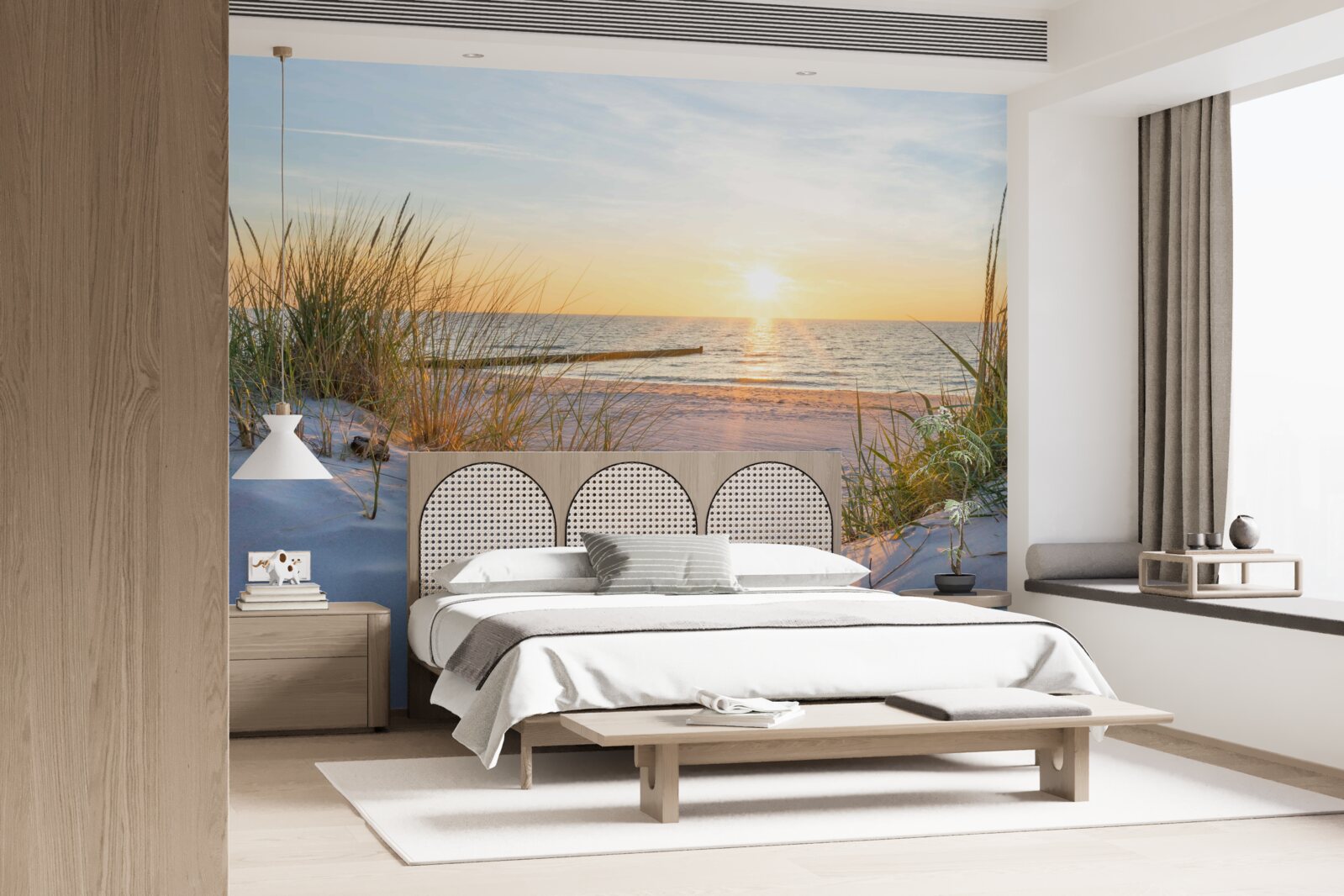 Fototapeta piaszczysta plaża ozdobiona jest zieloną trawą