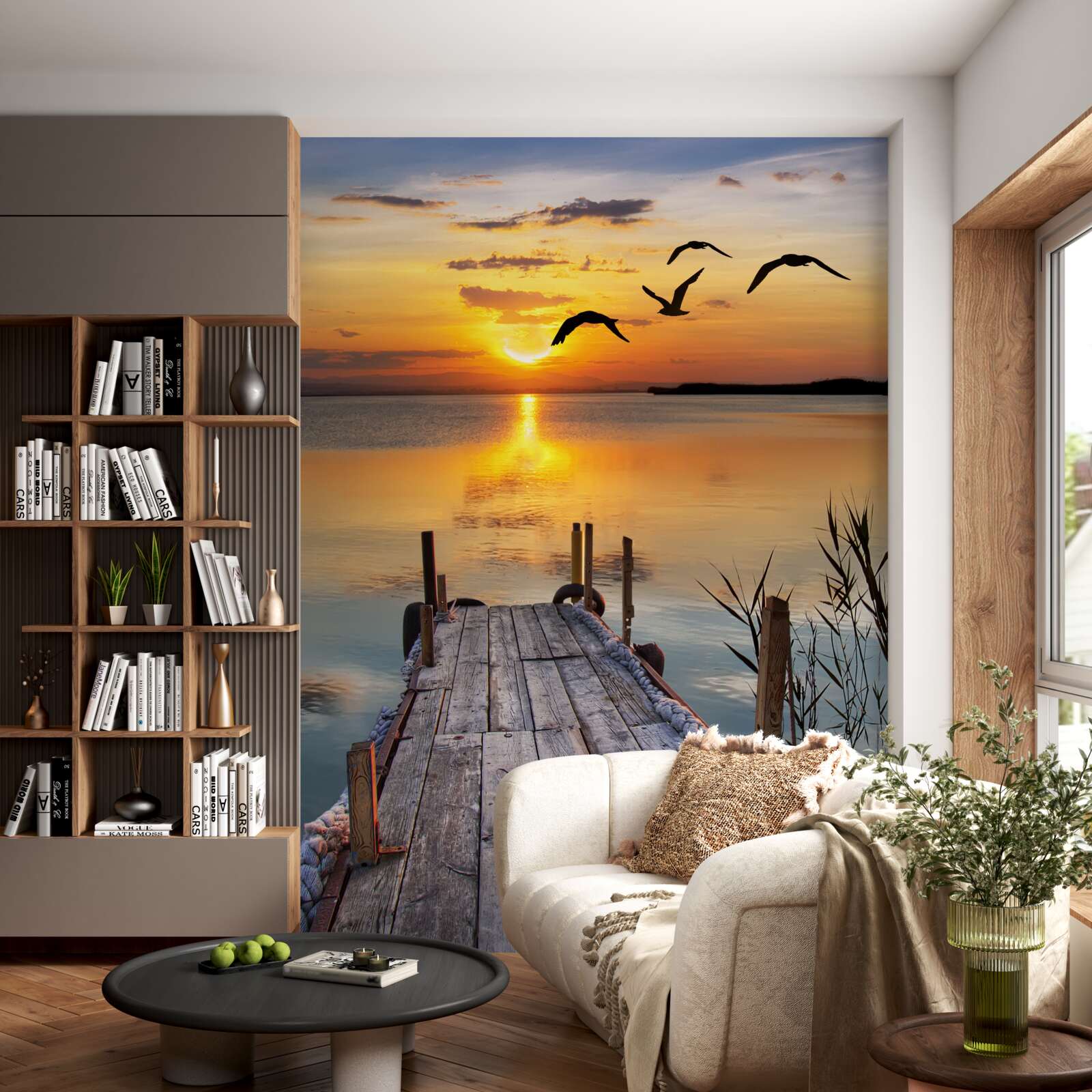 Fototapeta ciepły zachód słońca na moście, gdzie krążą mewy