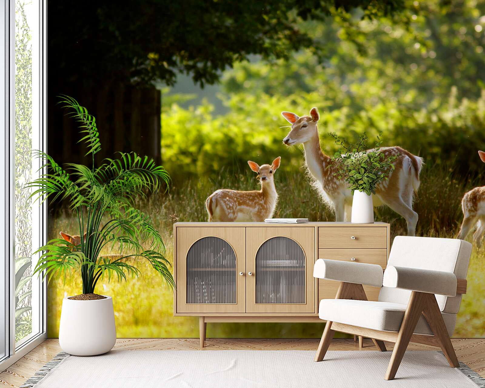 Fototapeta na polu pasie się grupa jeleni z cętkowaną sierścią