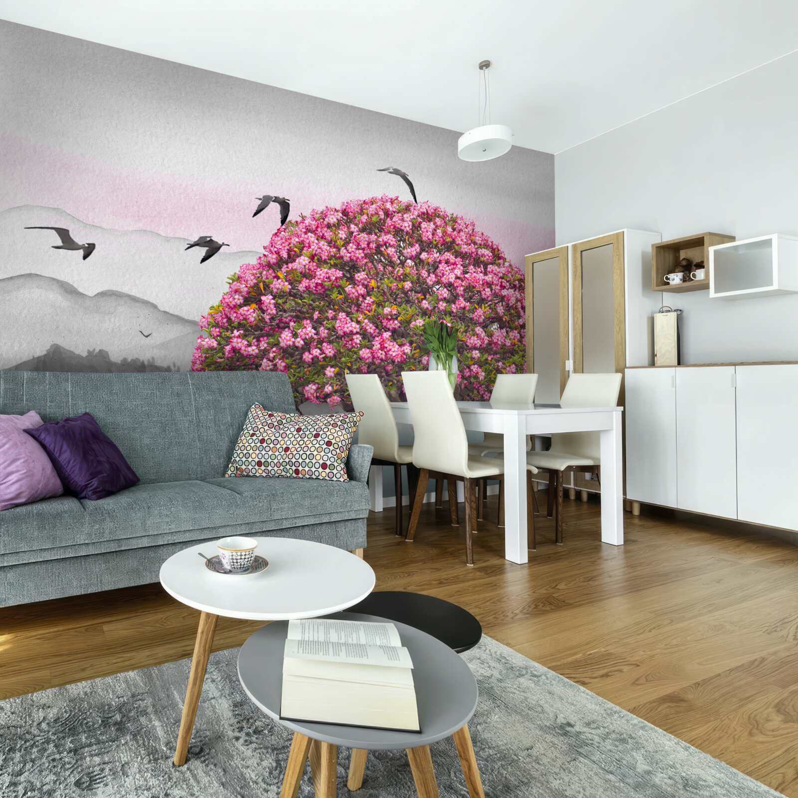 Fototapeta ptaki latają nad kwitnącym drzewem