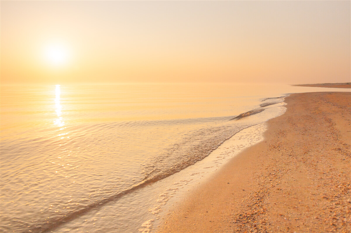 Fototapeta zachód słońca nad morzem w lecie