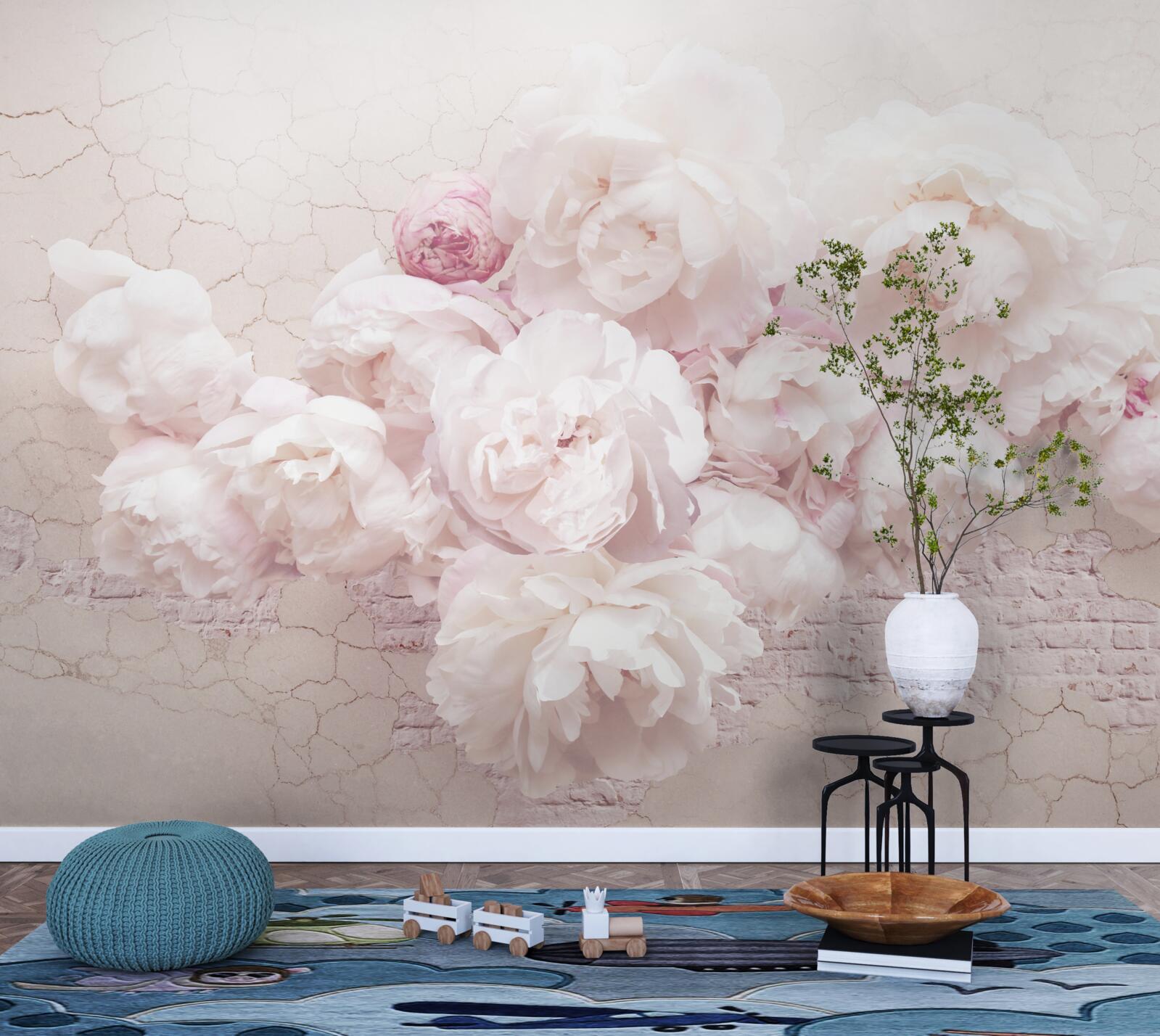 Fototapeta bujne butiki z kwiatami na skalistym tle