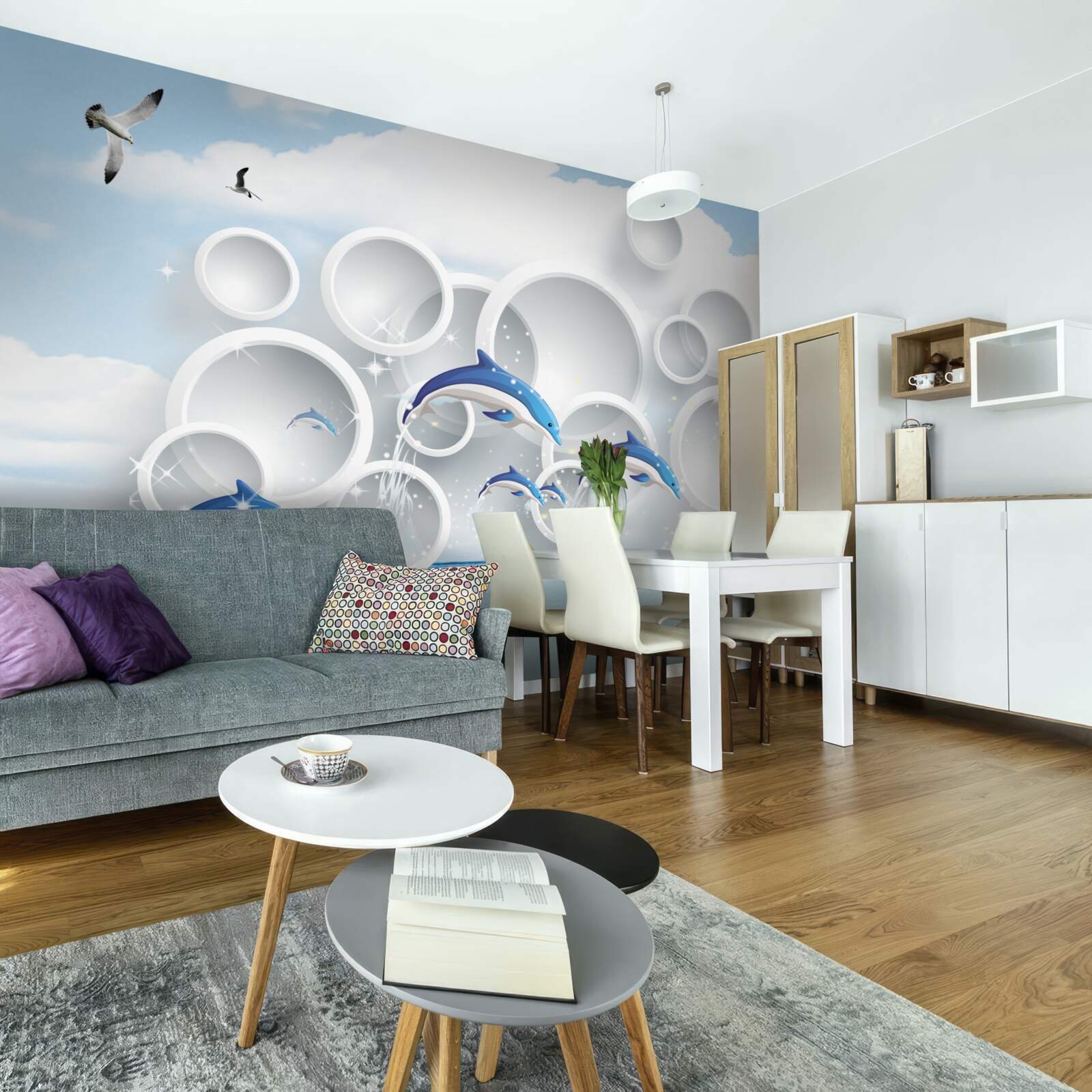 Fototapeta abstrakcyjne pierścienie i delfiny skaczące po powierzchni wody