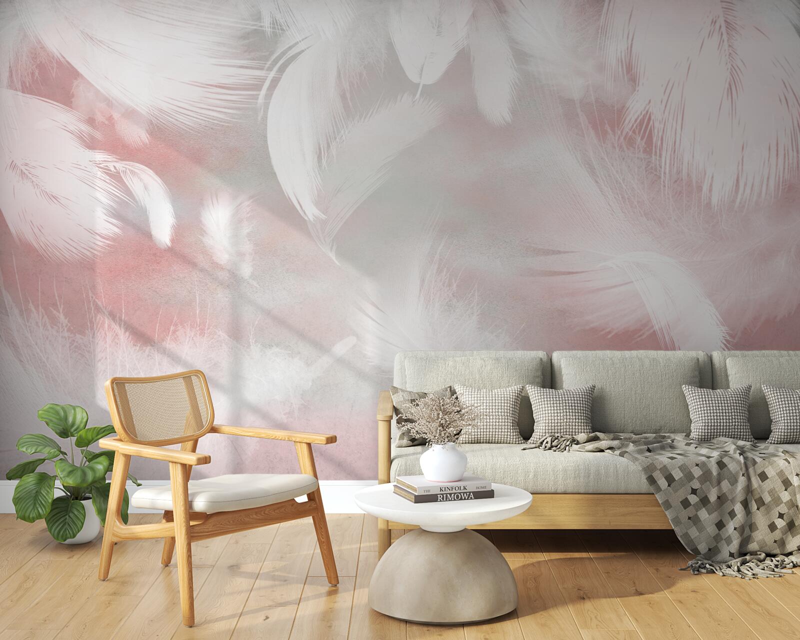 Fototapeta różowe tło ozdobione jest białymi piórkami