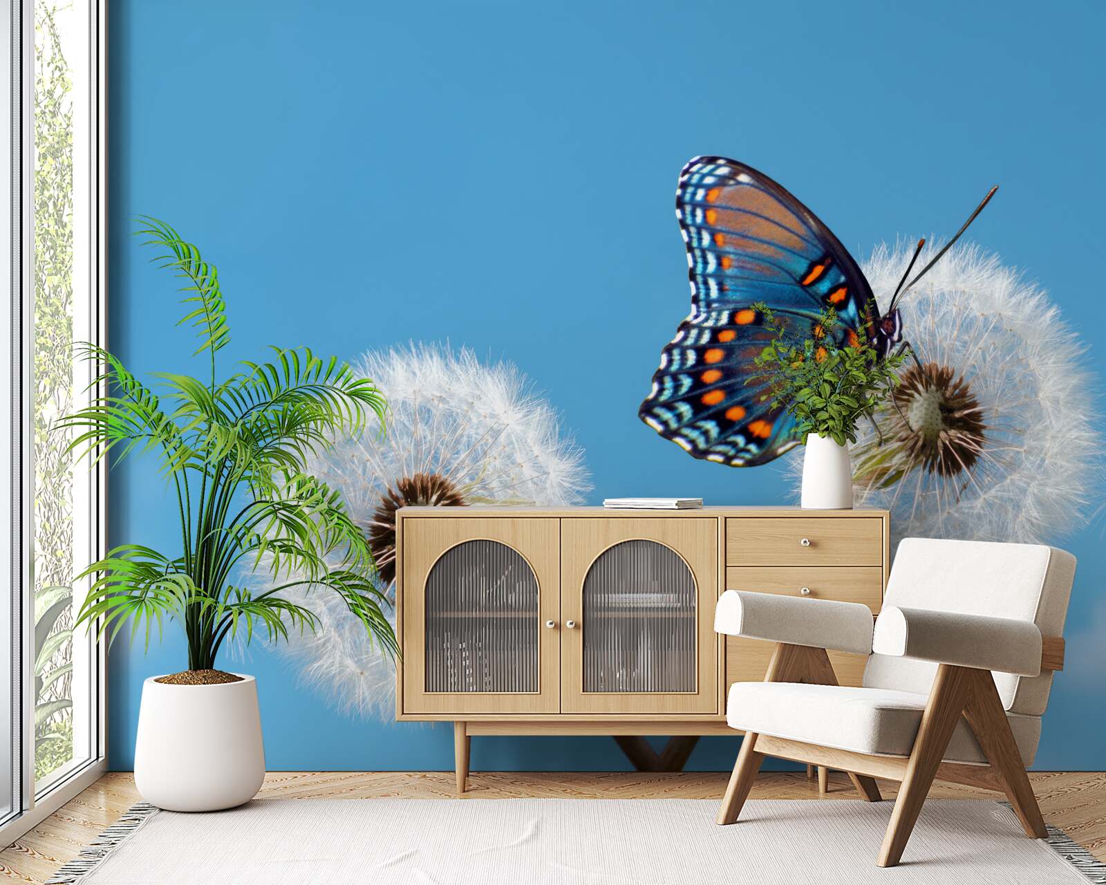 Fototapeta motyl siedzi na zwiędłym mniszku