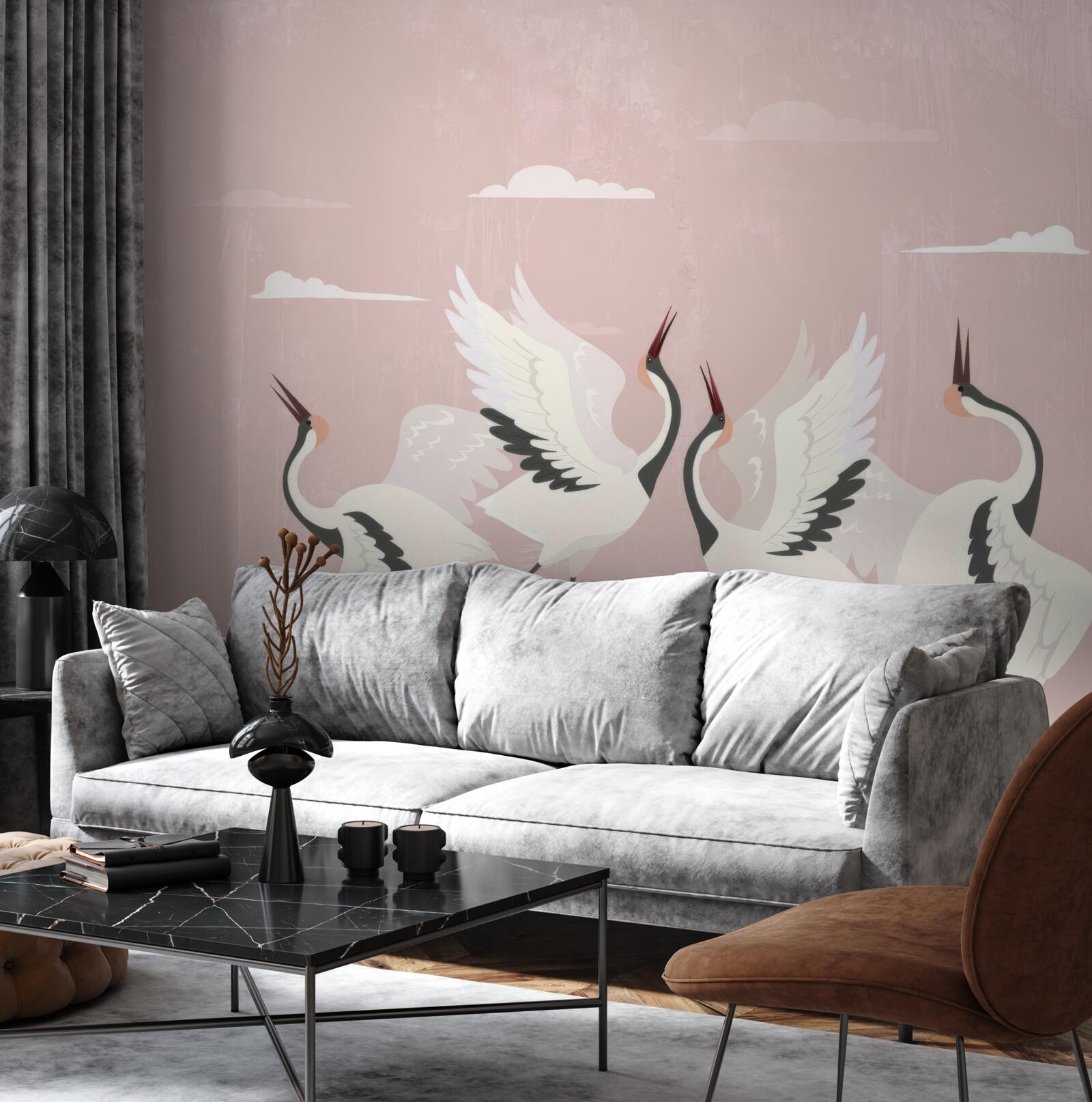 Fototapeta bociany wyciągają szyje i patrzą w górę