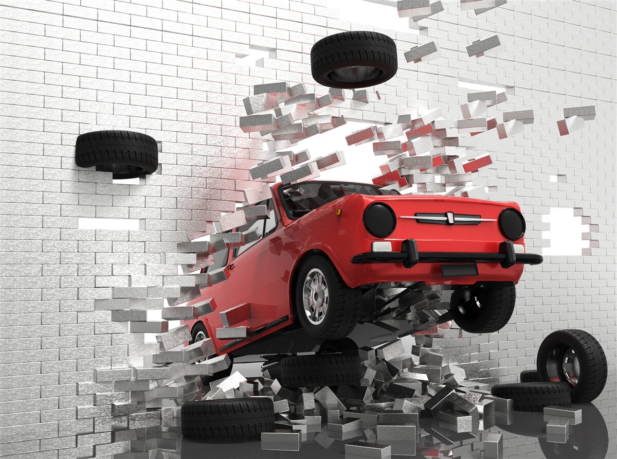 Fototapeta samochód przebija ceglaną ścianę