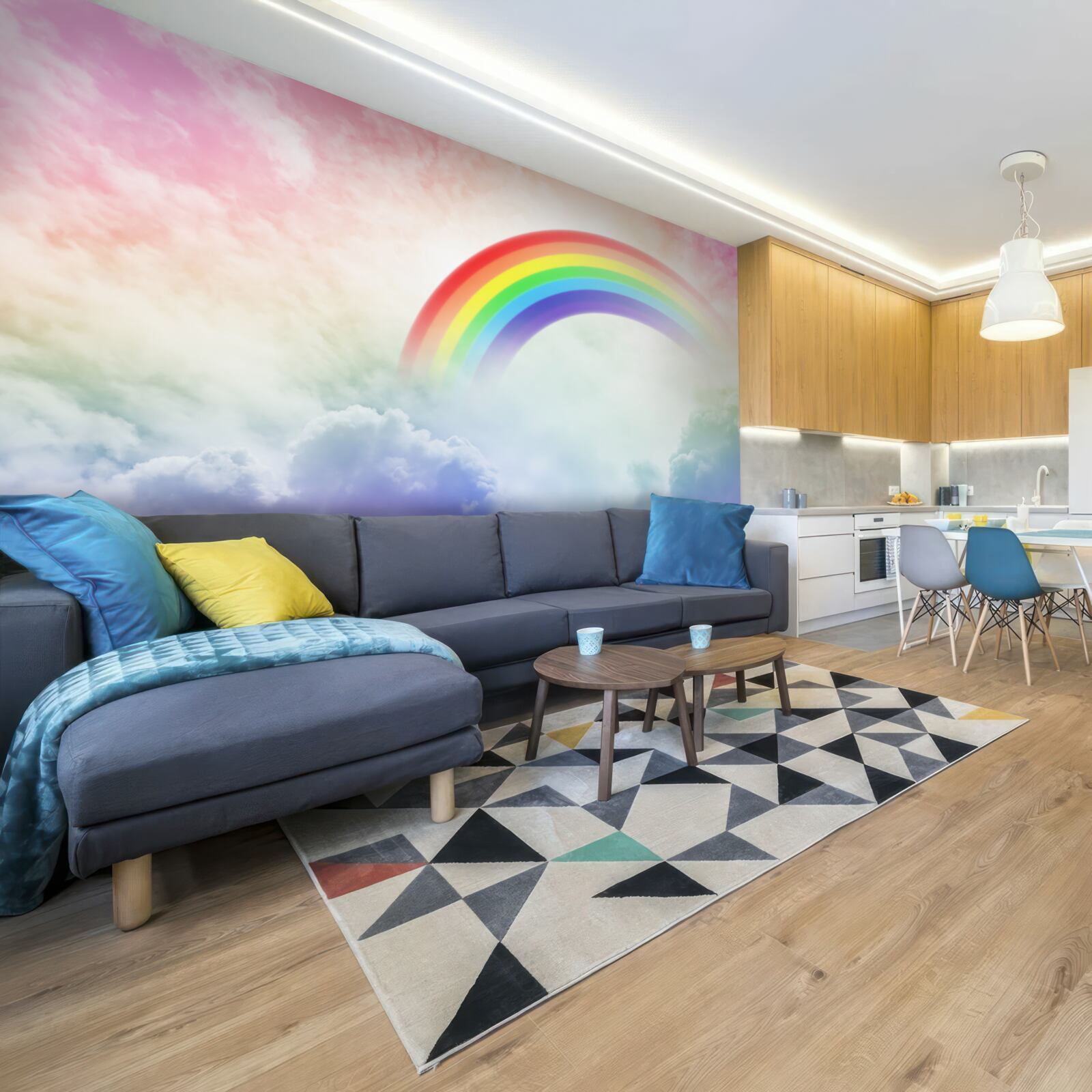 Fototapeta nad chmurami świeci kolorowa tęcza