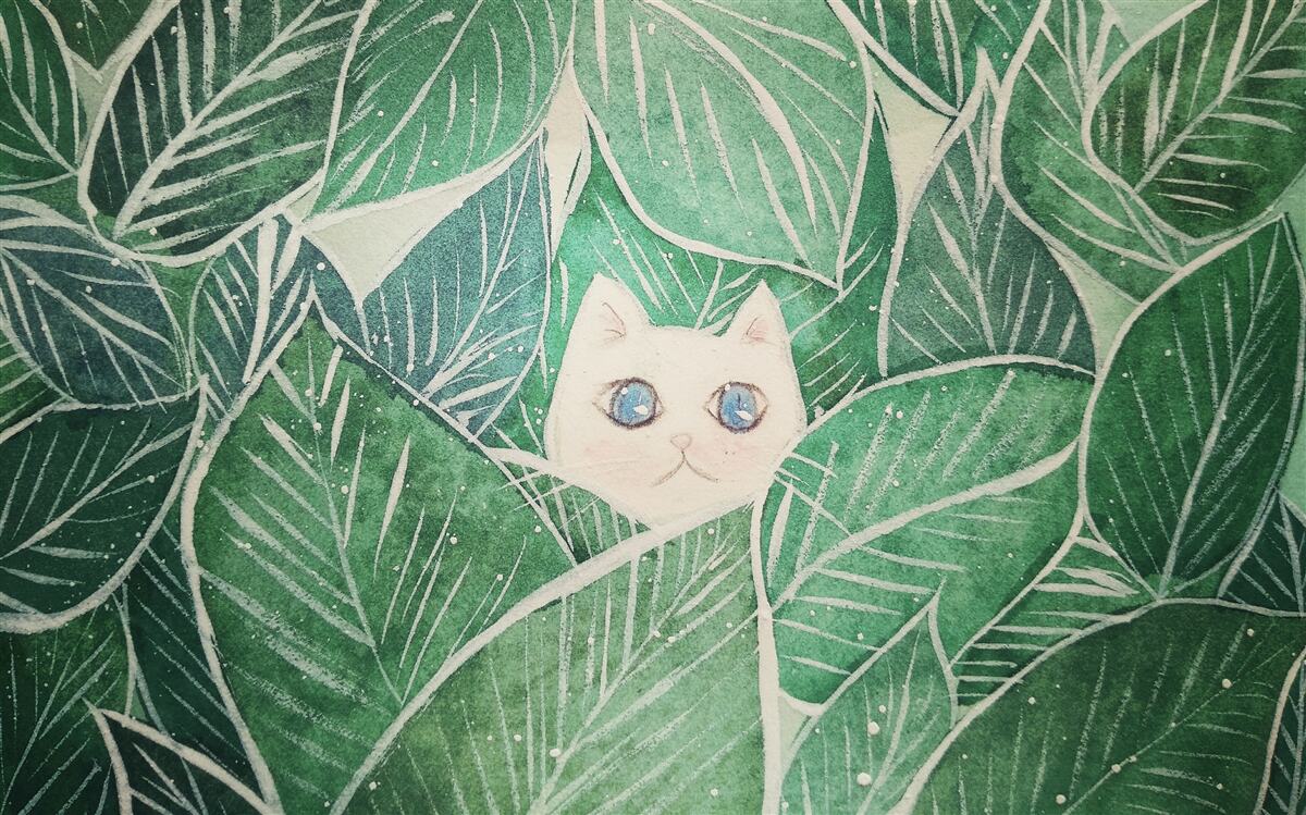 Fototapeta mały kot zgubił się wśród zielonych liści