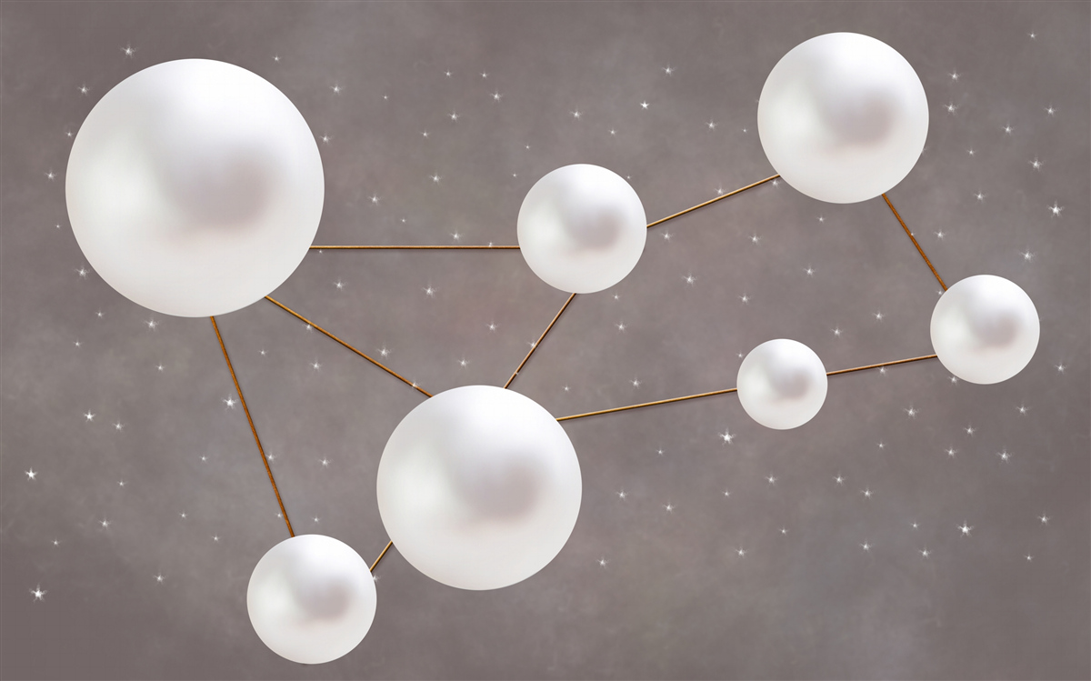 Fototapeta białe kulki ozdobione złotymi liniami są rozrzucone na szarym tle