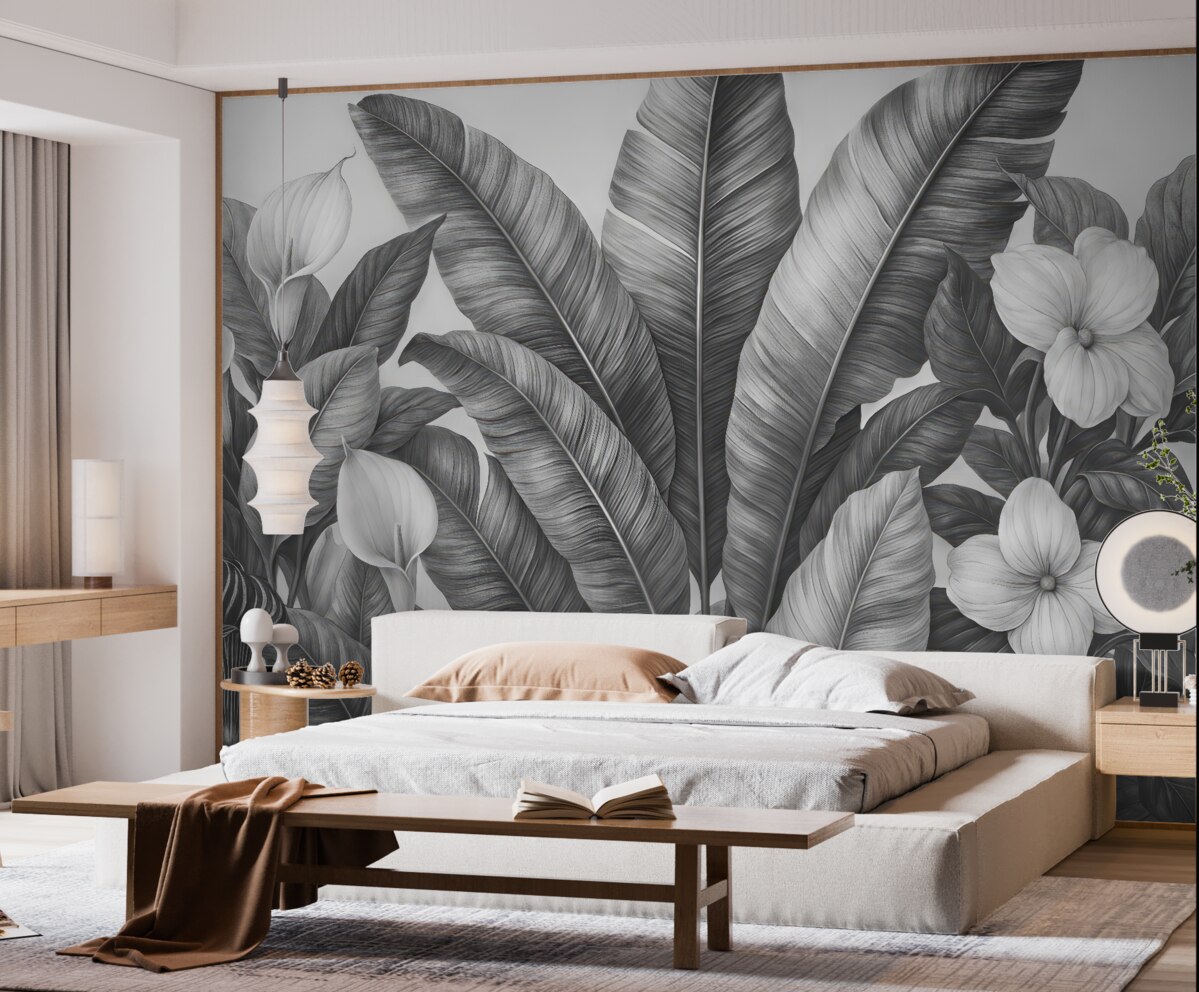 Fototapeta Stylowe tropikalne liście z kwiatami w odcieniach czerni i bieli.