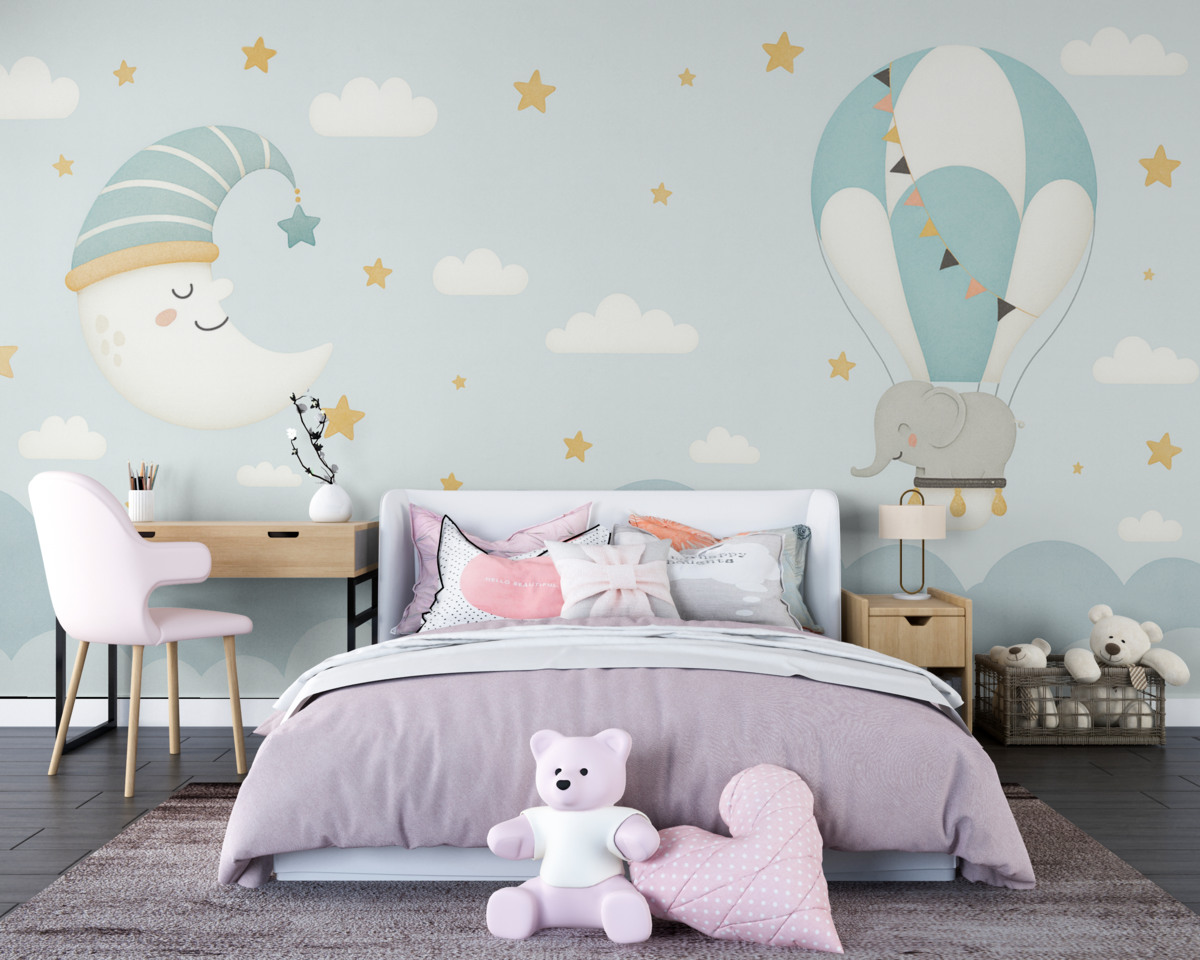 Fototapeta Słoń na balonie w niebieskich chmurach.