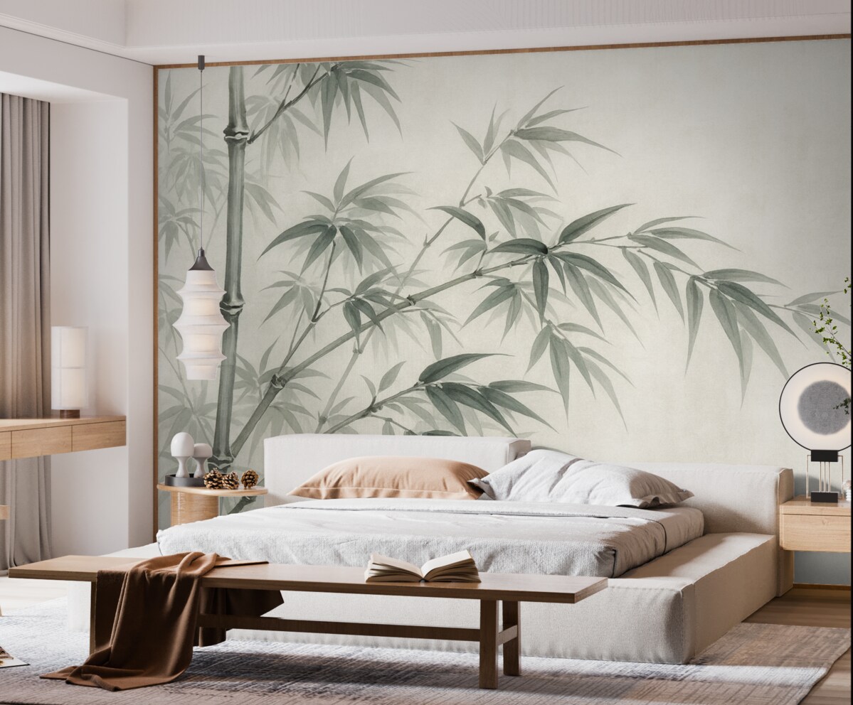 Fototapeta Liście bambusa na jasnym, plamkowanym tle przypominającym akwarelę.