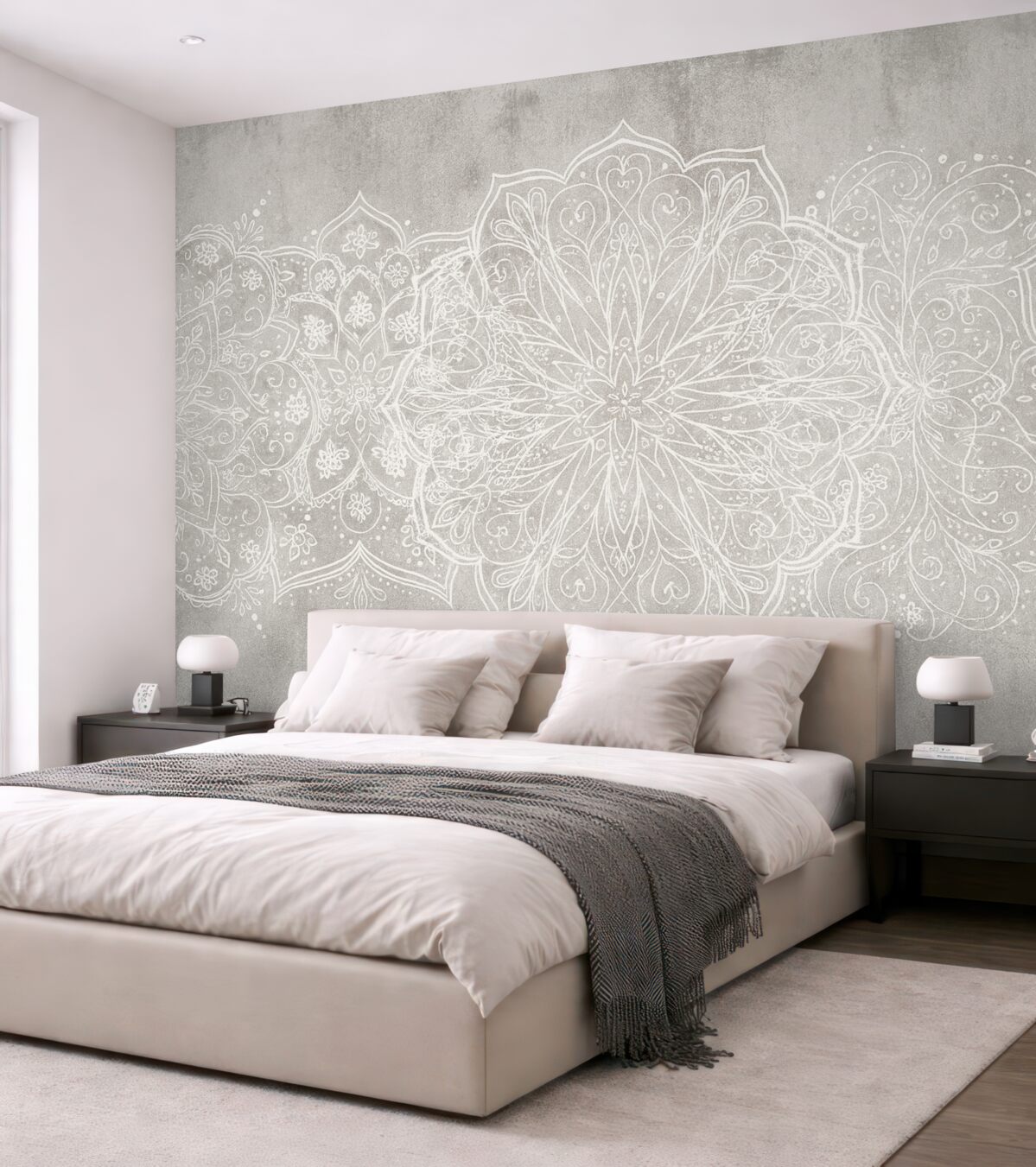 Fototapeta Szczegółowy, kunsztowny wzór mandali z białej koronki na teksturowanym tle szarej ściany w stylu industrialnym.