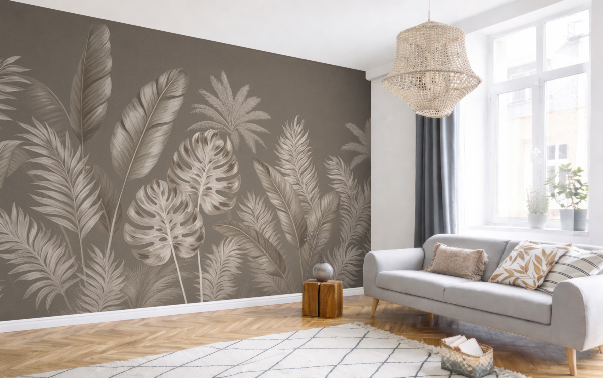 Fototapeta Obszerne, subtelne beżowe liście na stonowanym szarym tle, kreujące wesołą i eteryczną aurę.