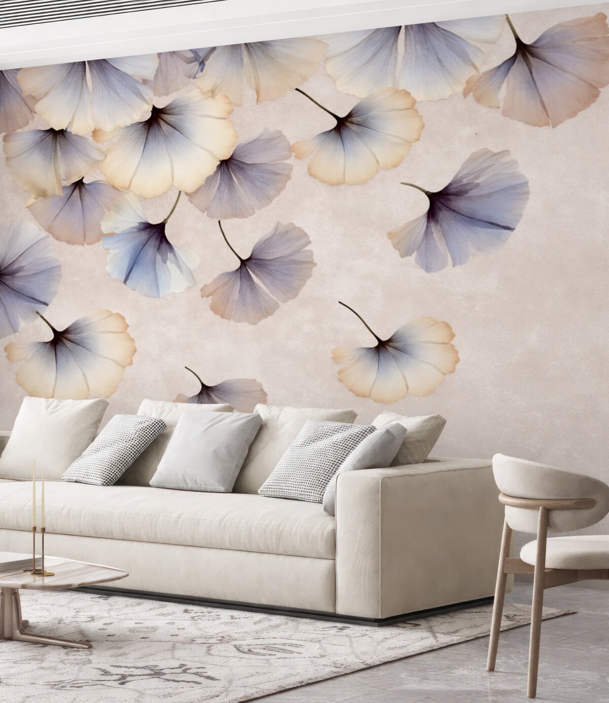 Fototapeta Pastelowe niebieskie i beżowe liście miłorzębu z subtelnymi płatkami unoszącymi się w powietrzu na fakturowanym tle.