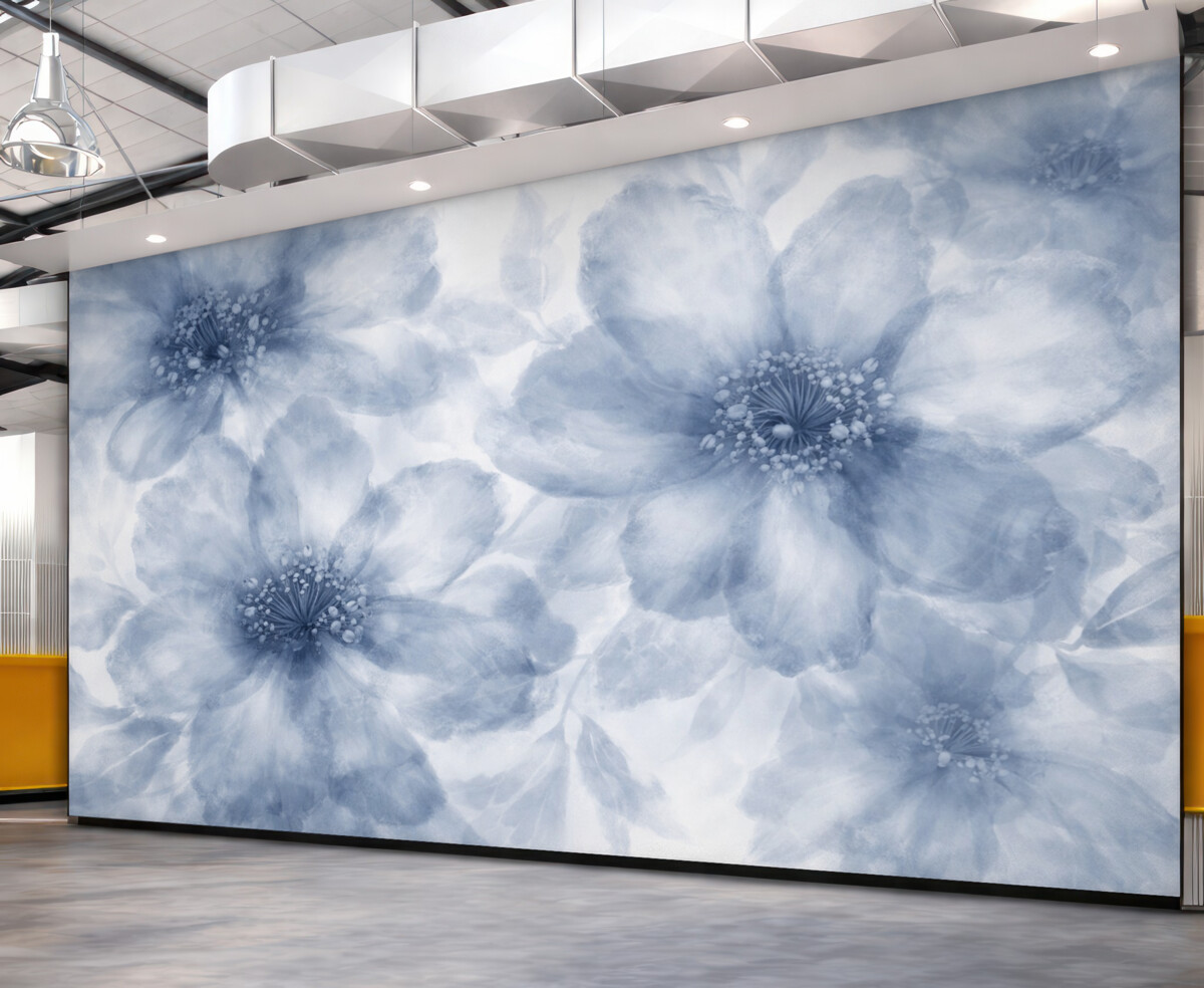 Fototapeta Miękkie, zamglone abstrakcyjne niebieskie kwiaty tworzą harmonijny i relaksujący kwiatowy wzór.