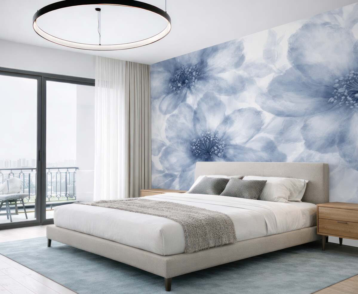 Fototapeta Miękkie, zamglone abstrakcyjne niebieskie kwiaty tworzą harmonijny i relaksujący kwiatowy wzór.