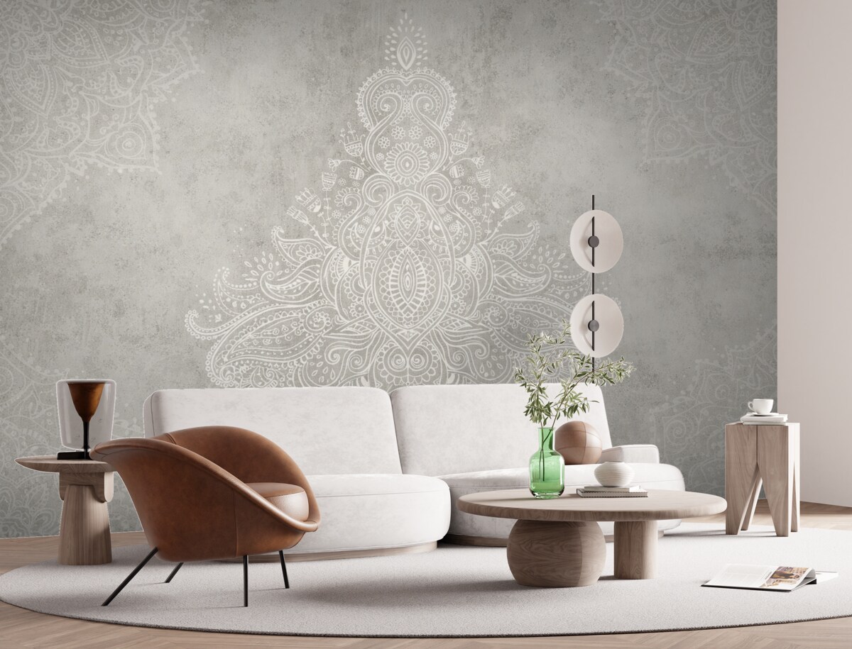 Fototapeta Szczegółowy, skomplikowany nadruk mandali z białej koronkowej tkaniny na jasnobeżowym, abstrakcyjnym tle.