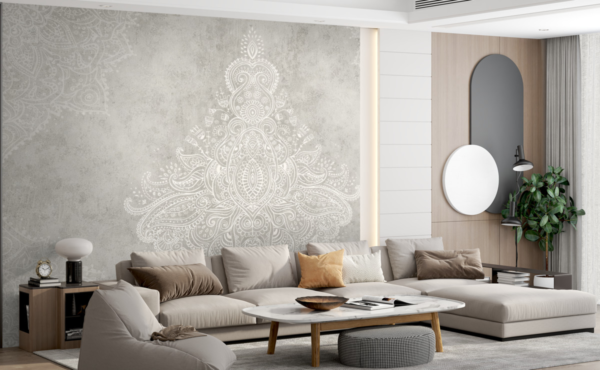 Fototapeta Szczegółowy, skomplikowany nadruk mandali z białej koronkowej tkaniny na jasnobeżowym, abstrakcyjnym tle.