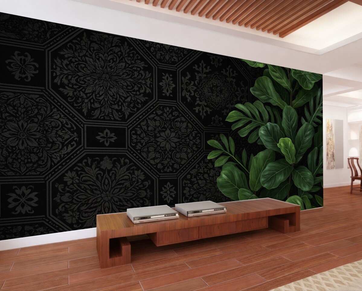 Fototapeta Ciemny, dekoracyjny, pęknięty abstrakcyjny motyw na czarnym tle, w kontraście z bogatymi zielonymi tropikalnymi liśćmi.