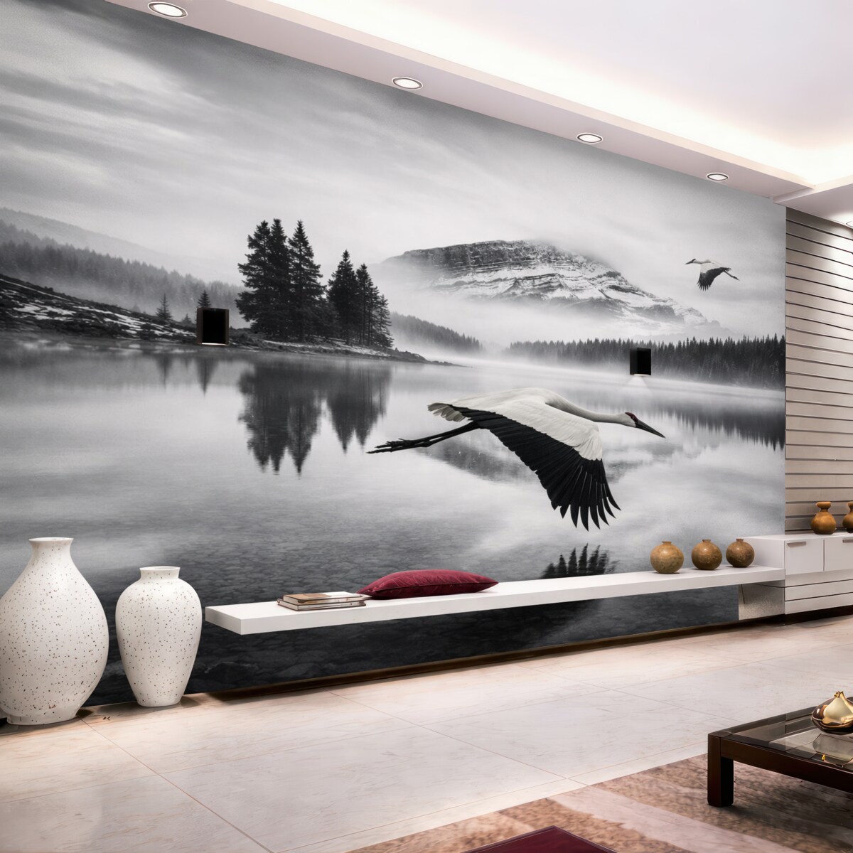 Fototapeta Bocian przelatuje nad rzeką i górami, czarno-biała sceneria z ptakami.