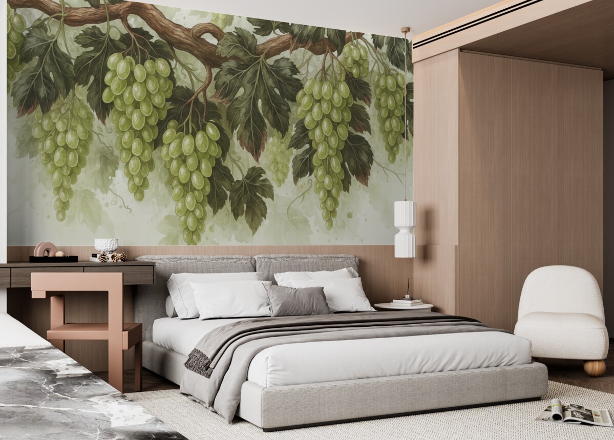 Fototapeta Winogrona zawieszone na winorośli z zielonymi liśćmi, na jasnym tle o fakturze przypominającej akwarelę.