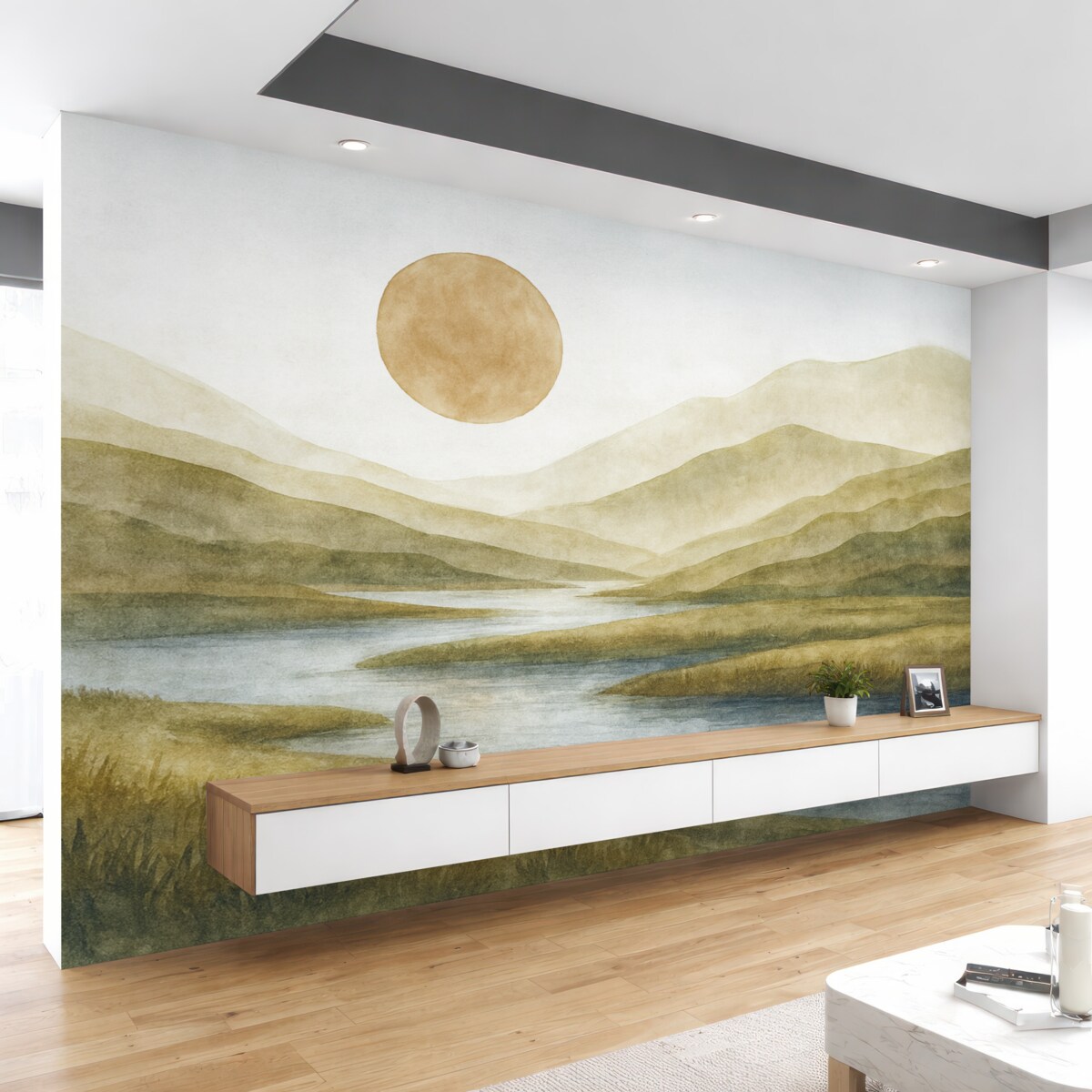 Fototapeta Widok na warstwowe góry o łagodnych zboczach, wijąca się rzeka oraz delikatne pomarańczowe słońce na firmamencie.