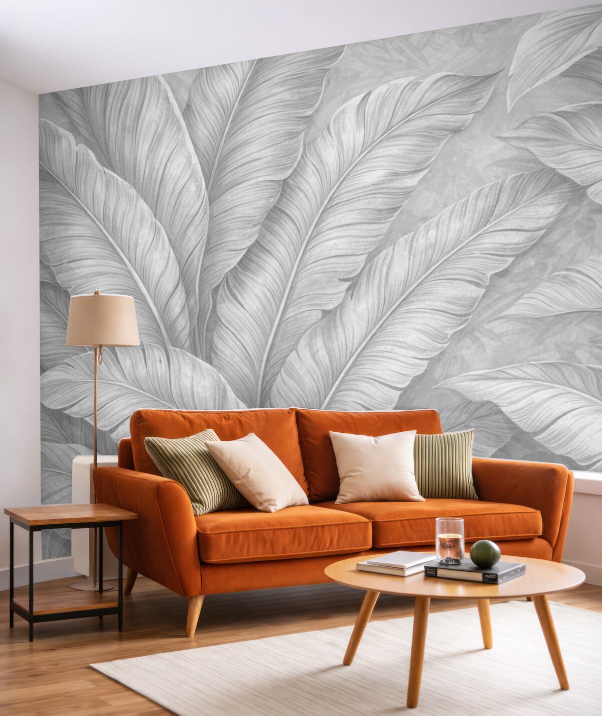 Fototapeta Szczegółowe, duże liście tropikalne w jednolitym, jasnym odcieniu szarości w stylu loftowym.