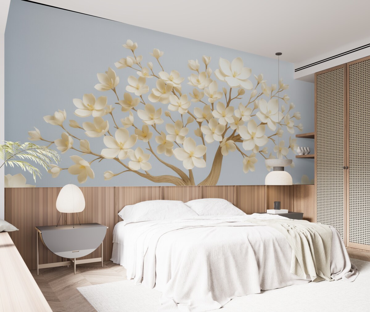 Fototapeta Drzewo z subtelnymi kwiatami na jasnoniebieskim tle.